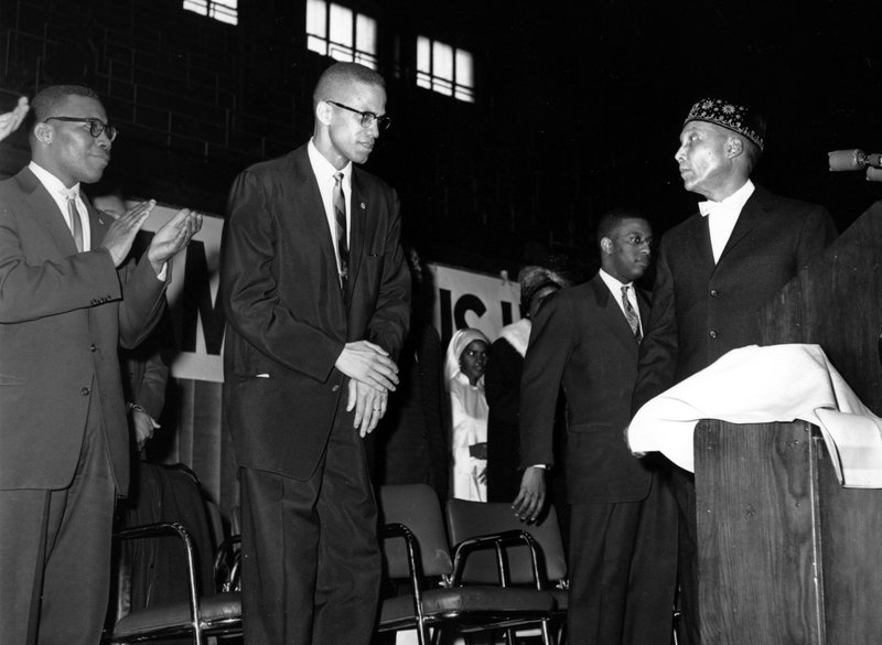 Figure 1: A deferential Malcolm X with Nation of Islam founder, Elijah Muhammad, Feb. 26, 1961